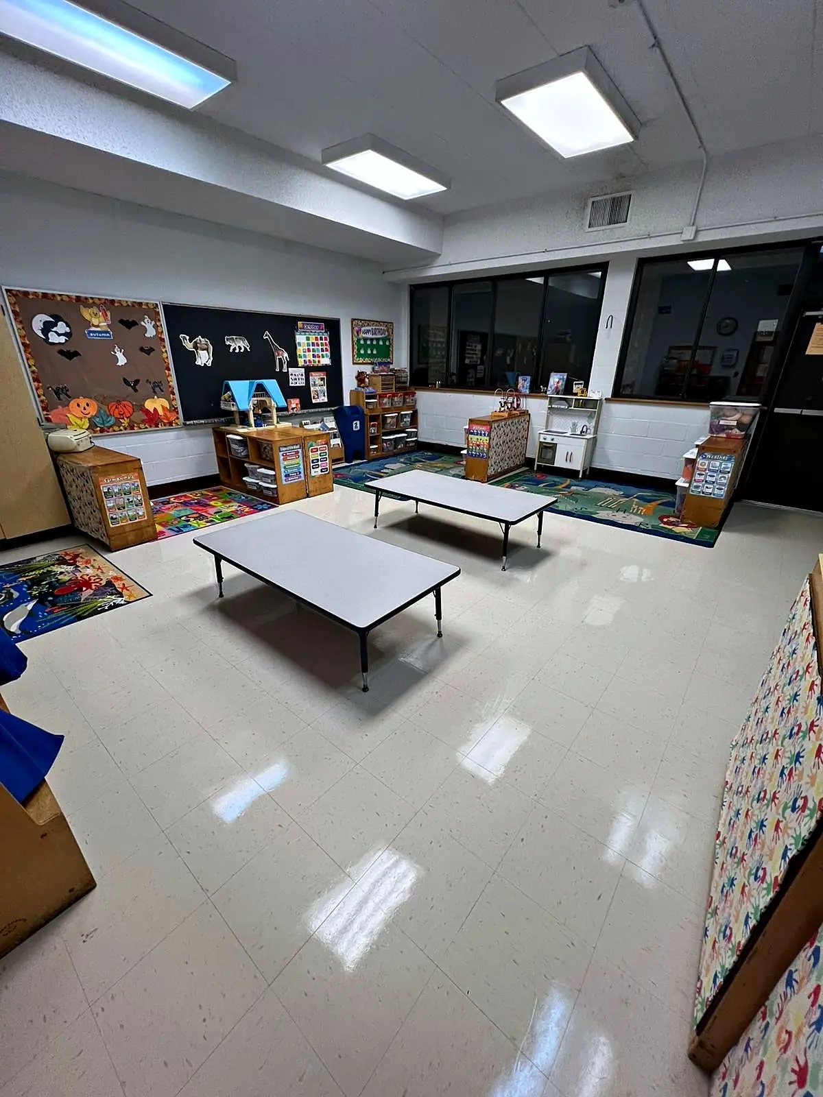 Daycare classroom with clean, glossy VCT tile floor